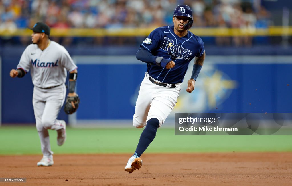 Miami Rays Christian Bethancourt of the Tampa Bay Rays runs to third second ...