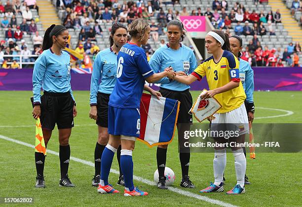 Sandrine Soubeyrand of France and Natalia Gaitan of Colombia shake hands prior to the Women's Football first round Group G match between France and...