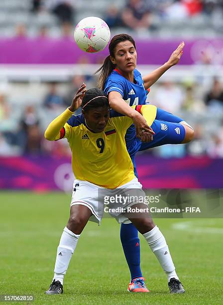 Carmen Rodallega of Colombia is challenged by Louisa Necib of France during the Women's Football first round Group G match between France and...