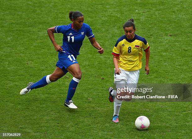 Yoreli Rincon of Colombia is chased by Marie-Laure Delie of France during the Women's Football first round Group G match between France and Colombia...