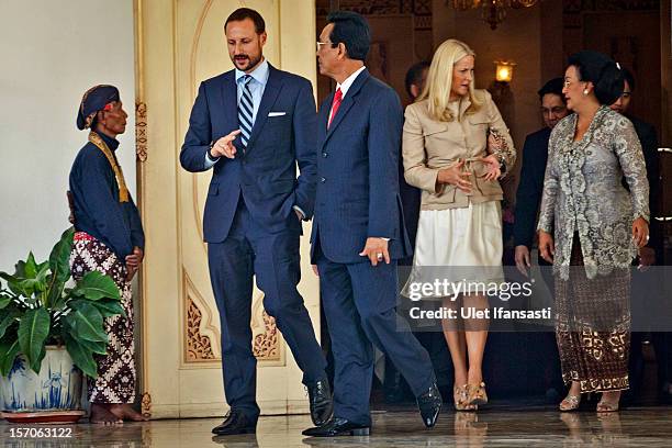 Crown Prince Haakon of Norway and Crown Princess Mette-Marit of Norway meet with Sri Sultan Hamengkubuwono X and his wife Gusti Kangjeng Ratu Hemas...