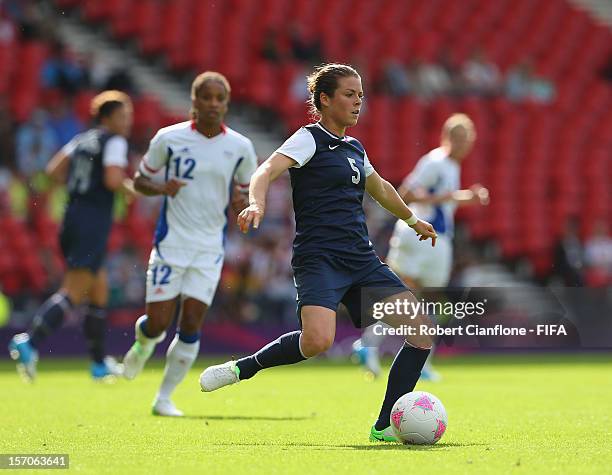 Kelley OHara of the USA kicks the ball during the Women's Football first round Group G Match of the London 2012 Olympic Games between United States...