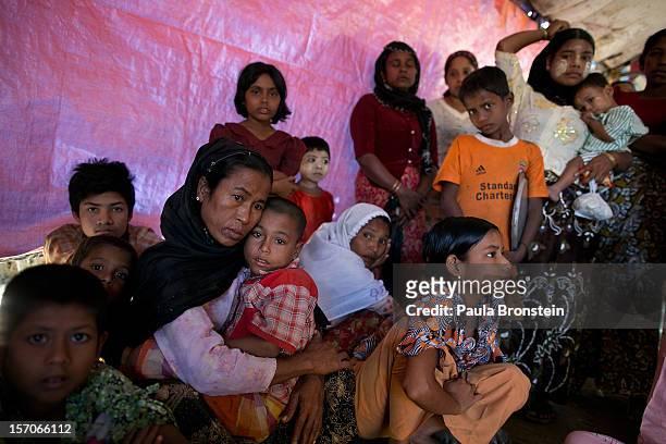 Rohingya patients wait for medical care at a government run medical clinic November 25, 2012 on the outskirts of Sittwe, Myanmar. An estimated...