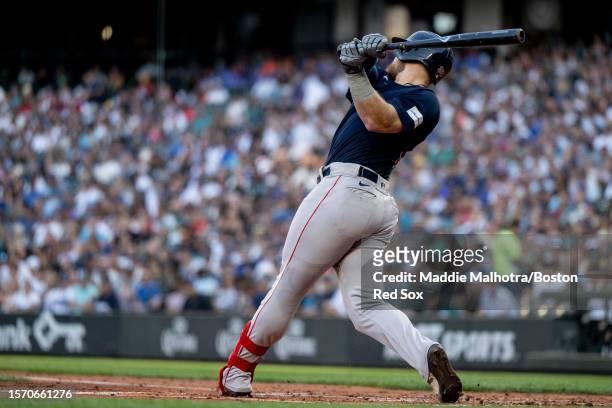 Christian Arroyo of the Boston Red Sox hits a ground-rule double during the fourth inning of a game against the Seattle Mariners on August 1, 2023 at...