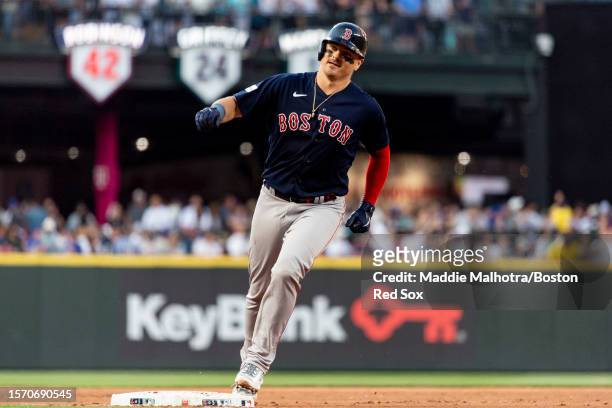 Reese McGuire of the Boston Red Sox reacts after hitting a home run during the sixth inning of a game against the Seattle Mariners on August 1, 2023...