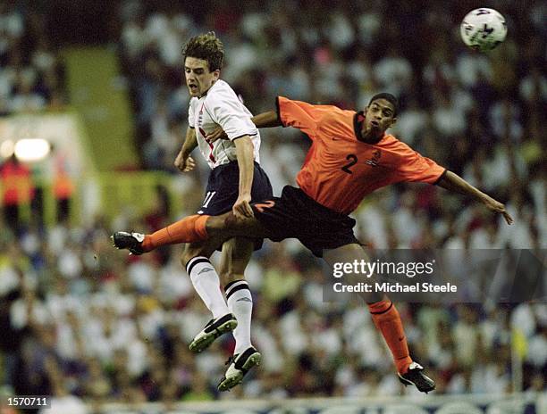 Owen Hargreaves of England rises above Michael Reiziger of Holland during the International Friendly match played at White Hart Lane in London....