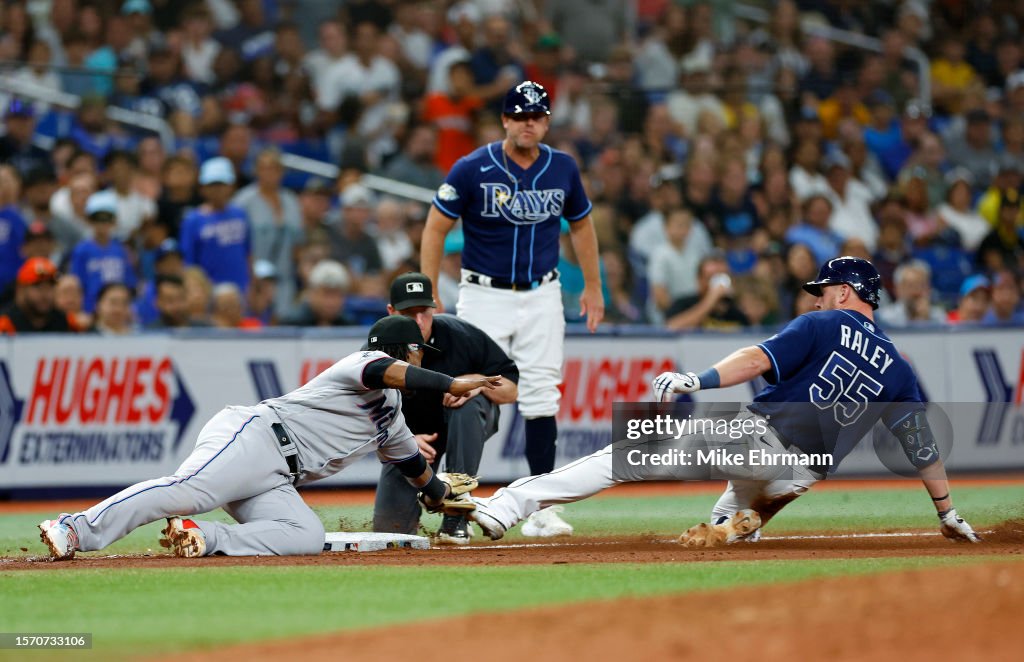 Miami Rays Luke Raley of the Tampa Bay Rays is tagged out at third by Jean... News ...