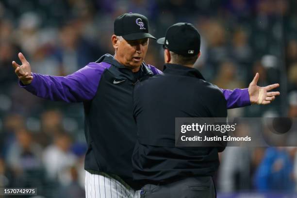 Manager Bud Black of the Colorado Rockies has an animated discussion with crew chief Chris Cuggione in the ninth inning against the San Diego Padres...