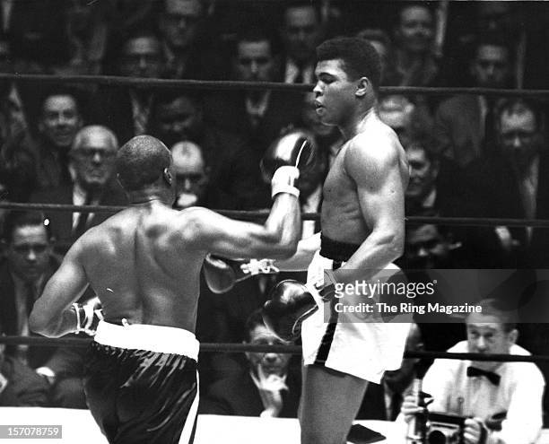 Cassius Clay avoids the right punch by Doug Jones during the fight at Madison Square Gardens on March 13,1963 in New York,New York. Muhammad Ali won...
