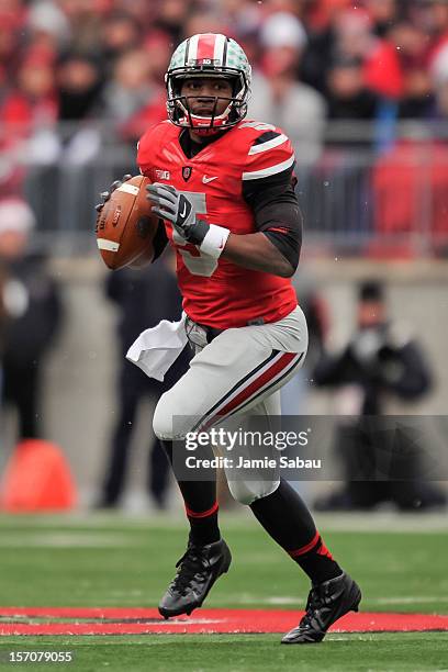 Quarterback Braxton Miller of the Ohio State Buckeyes controls the ball against the Michigan Wolverines at Ohio Stadium on November 24, 2012 in...