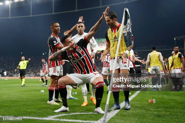 Luciano of Sao Paulo celebrates after the team's first goal scored by an own goal of goalkeeper Cássio Ramos of Corinthians during a semifinal first...