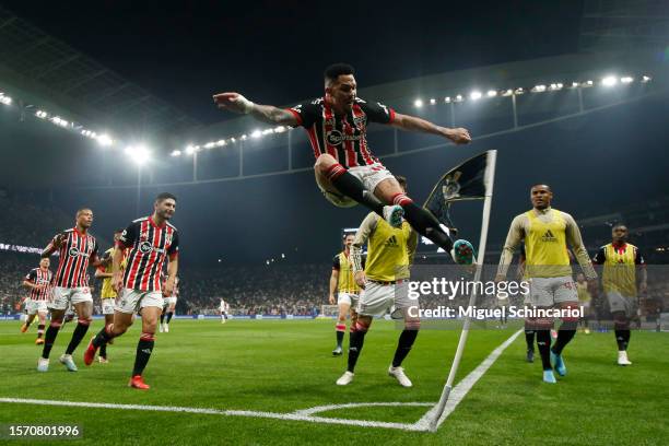 Luciano of Sao Paulo celebrates after the team's first goal scored by an own goal of goalkeeper Cássio Ramos of Corinthians during a semifinal first...