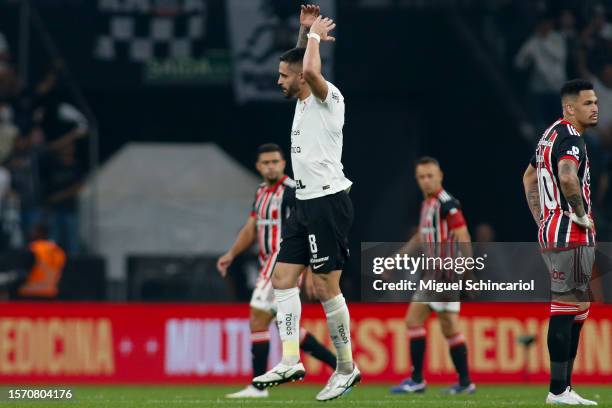 Renato Augusto of Corinthians celebrates after scoring the team's first goal during a semifinal first leg match between Corinthians and Sao Paulo as...