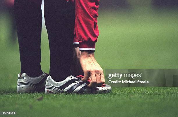 David Beckham of Manchester United boots during the FA Carling Premiership match against Ipswich Town played at Old Trafford, in Manchester, England....