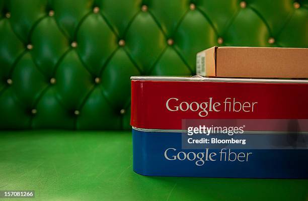 Boxes of equipment needed to install Google Fiber broadband network sit on a couch at the home of customer Becki Sherwood in Kansas City, Kansas,...