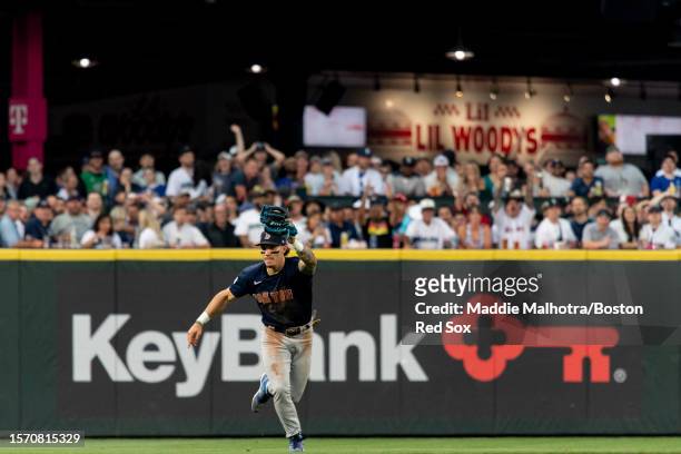 Jarren Duran of the Boston Red Sox reacts after making a catch during a game against the Seattle Mariners on August 1, 2023 at T-Mobile Park in...