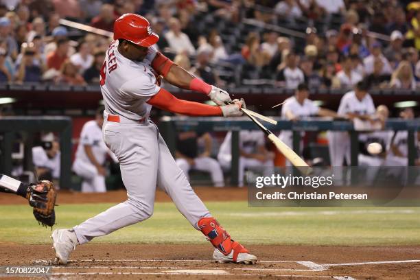 Jordan Walker of the St. Louis Cardinals breaks his bat on a ground-ball out during the second inning of the MLB game against the Arizona...