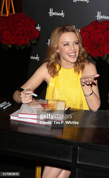 Kylie Minogue attends a photocall to launch her new book 'Kylie/Fashion' at Harrods on November 28, 2012 in London, England.