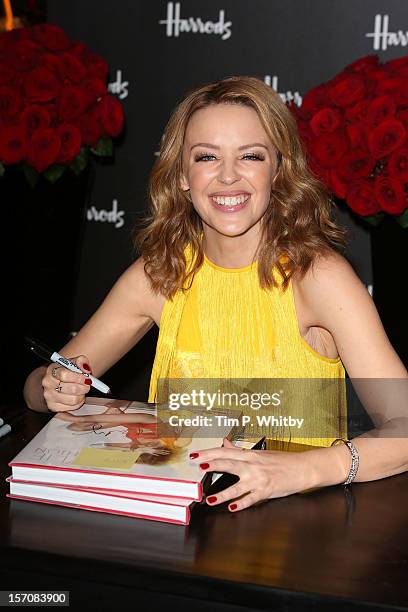 Kylie Minogue attends a photocall to launch her new book 'Kylie/Fashion' at Harrods on November 28, 2012 in London, England.