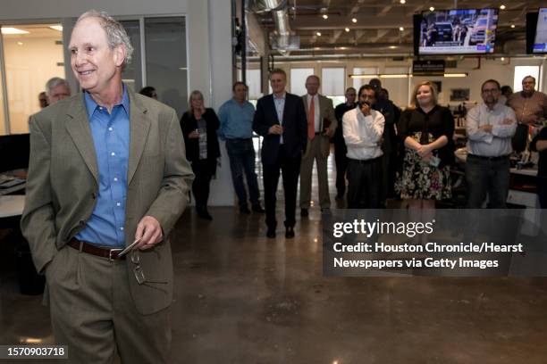 Steve Riley, left, speaks to the newsroom after he was named the Houston Chronicle's new executive editor on Thursday, May 2 in Houston. Riley has...