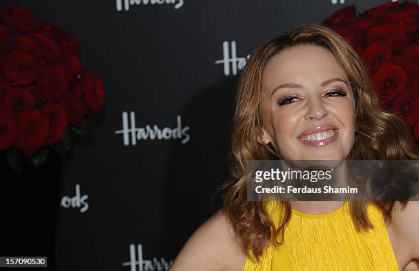 Kylie Minogue attends a photocall to launch her new book 'Kylie/Fashion' at Harrods on November 28, 2012 in London, England.