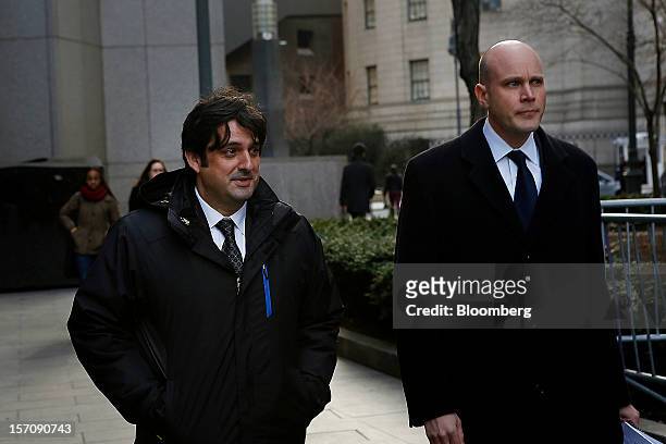 Paul Ceglia, indicted on charges of mail fraud and wire fraud, left, arrives with his attorney, Dean Boland, at federal court in New York, U.S., on...