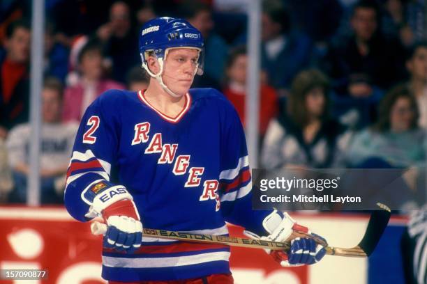 Brian Leetch of the New York Rangers looks on during a hockey game against the Washington Capitals on December 13, 1989 at Capital Centre in...