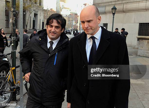 Paul Ceglia, indicted on charges of mail fraud and wire fraud, left, exits federal court with his attorney, Dean Boland, in New York, U.S., on...