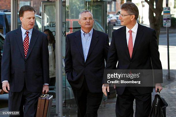 Robert Kaluza, a well site manager for BP Plc during the 2010 explosion on board the Deepwater Horizon oil rig, center, arrives at federal court with...