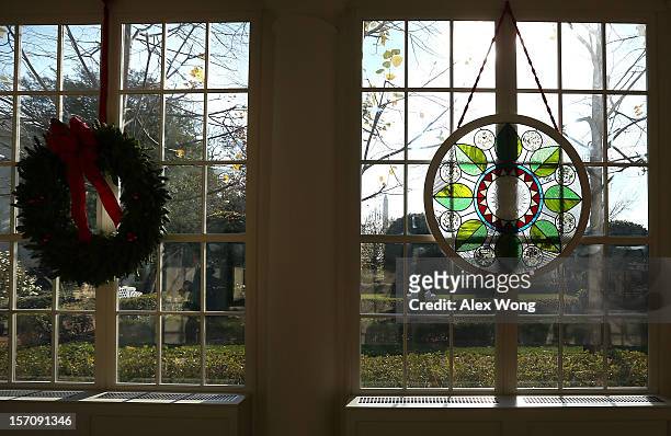 Stained glass window, created by Chicago-based artist David Lee Csicsko, is on display at the East Wing during a preview of the 2012 White House...
