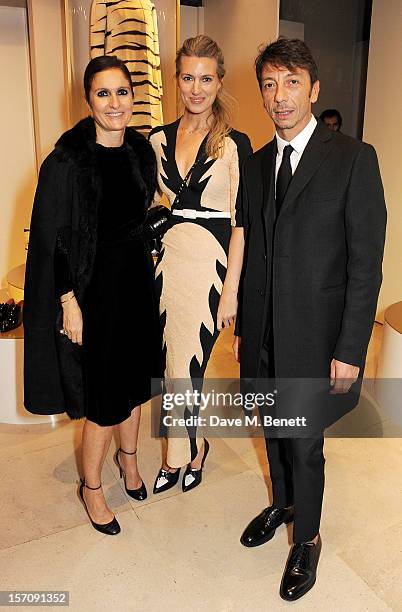 Maria Grazia Chiuri, Sarah Harris and Pier Paolo Piccioli attends a private view of 'Valentino: Master Of Couture', exhibiting from November 29th,...