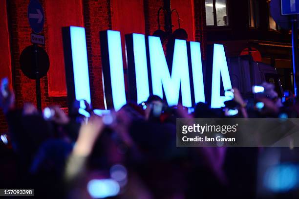 Crowds watch Deadmau5 at the launch event of the New Nokia Lumia Range at Flat Iron Square on November 28, 2012 in London, England.