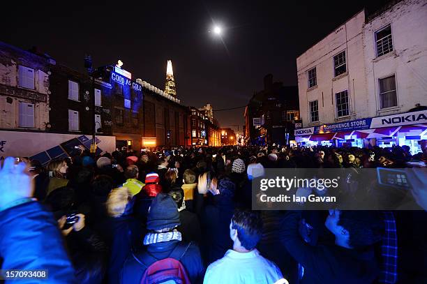 Crowds watch Deadmau5 at the launch event of the New Nokia Lumia Range at Flat Iron Square on November 28, 2012 in London, England.