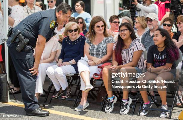 Houston Police Chief Art Acevedo greets the family of Lesha Adams, from left, Ruth Adams, Stephanie Marsh, Olivia Adams-Marsh and Ava Adams Marsh, as...