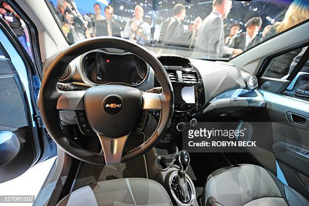 The interior of the 2013 Chevrolet Spark EV is seen as the Spark is unveiled at the Los Angeles Auto Show in Los Angeles, California on media preview...