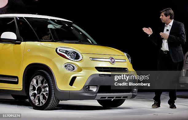 Olivier Francois, president and chief executive officer of Fiat SpA's Chrysler brand, introduces the new Fiat 500L vehicle during the LA Auto Show in...