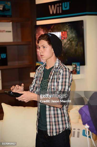 Actor Tom Holland got an exclusive look at the new Wii U console during The Variety Studio: Awards Edition held at a private residence on November...