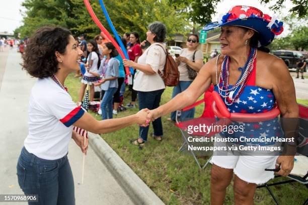 Harris County Judge Lina Hidalgo greet parade goers along the route during the 20th Annual Lindale Park 4th of July Parade on Thursday, July 4 in...