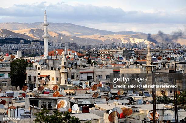 rooftops in damascus, syria - damasco foto e immagini stock
