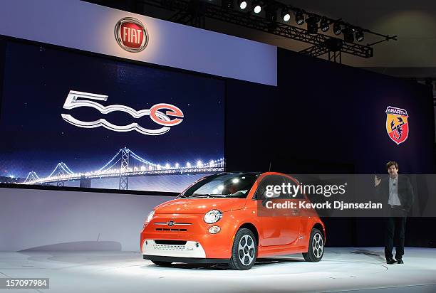 Olivier Francois, chief marketing officer for Chrysler Group, unveils the Fiat 500e electric car during the Los Angeles Auto show on November 28,...