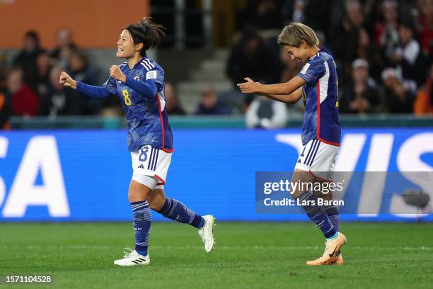 Hikaru Naomoto of Japan celebrates with teammate Mina Tanaka after scoring her team's first goal during the FIFA Women's World Cup Australia & New...