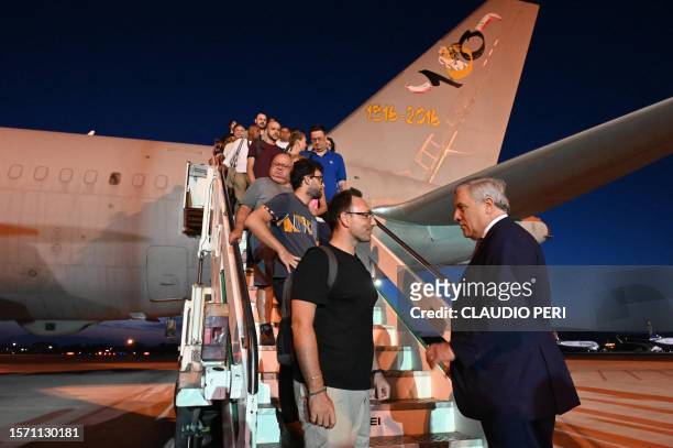 Italy's Deputy Prime Minister and Foreign Minister, Antonio Tajani , welcomes people from different nationalities after a special flight arranged by...
