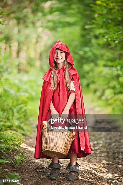 little red riding hood - red dress child stock pictures, royalty-free photos & images