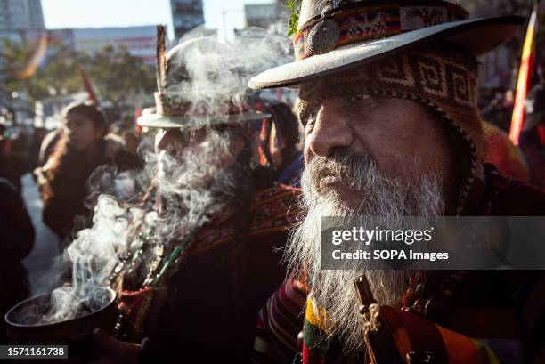 Protesters perform an indigenous ritual during a demonstration on the occasion of "La Pachamama," or Mother Earth Day. Indigenous leaders from the...