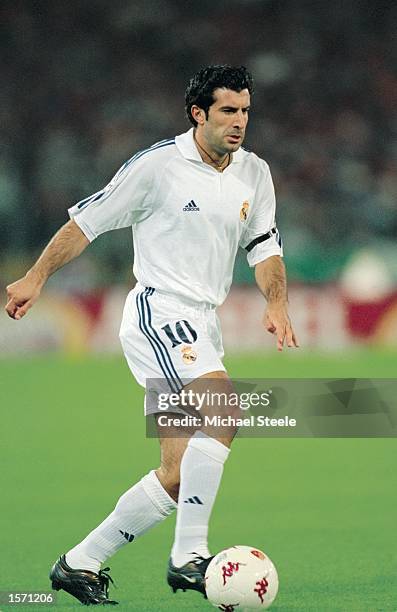 Luis Figo of Real Madrid looks to run with the ball during the UEFA Champions League Group A match against AS Roma played at the Stadio Olimpico, in...