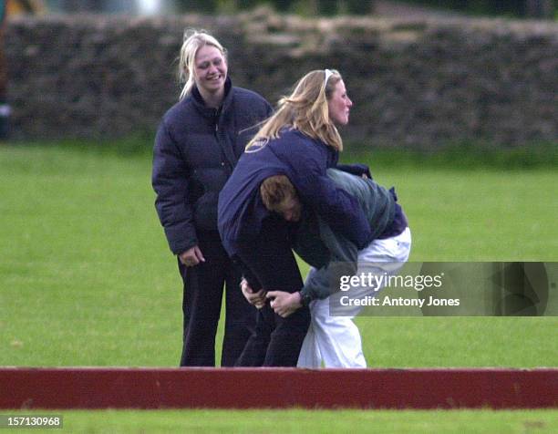 Playful Prince Harry & Friends At The Beaufort Polo Club, Near Tetbury, Gloucestershire.