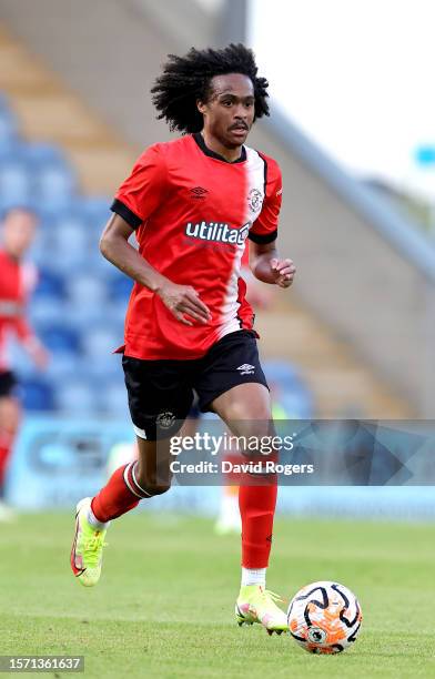 Tahith Chong of Luton Town runs with the ball during the pre-season friendly match between Ipswich Town and Luton Town at JobServe Community Stadium...