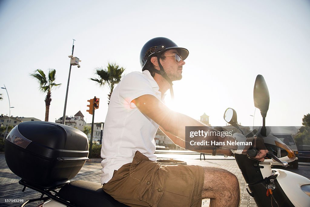 Man riding scooter, Turkey
