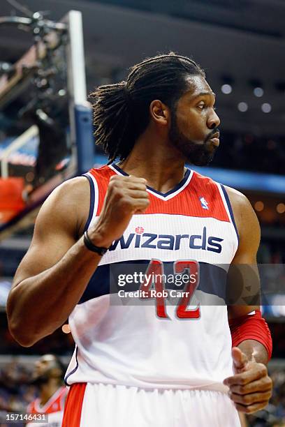 Nenê of the Washington Wizards celebrates after scoring a second half basket during the Wizards 84-82 win over the Portland Trail Blazers at Verizon...