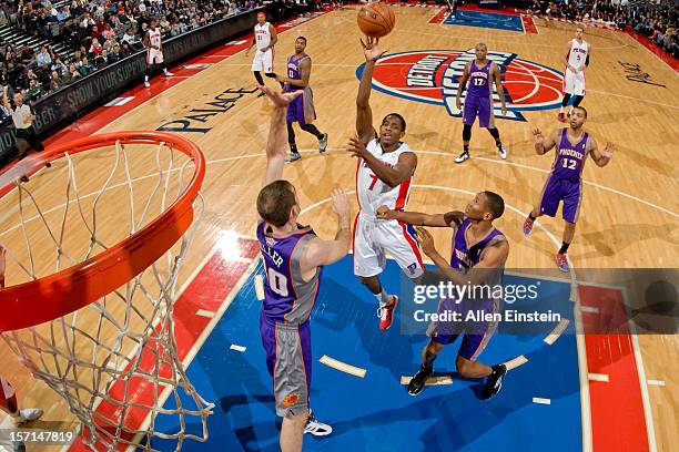 Brandon Knight of the Detroit Pistons shoots in the lane against Luke Zeller of the Phoenix Suns on November 28, 2012 at The Palace of Auburn Hills...